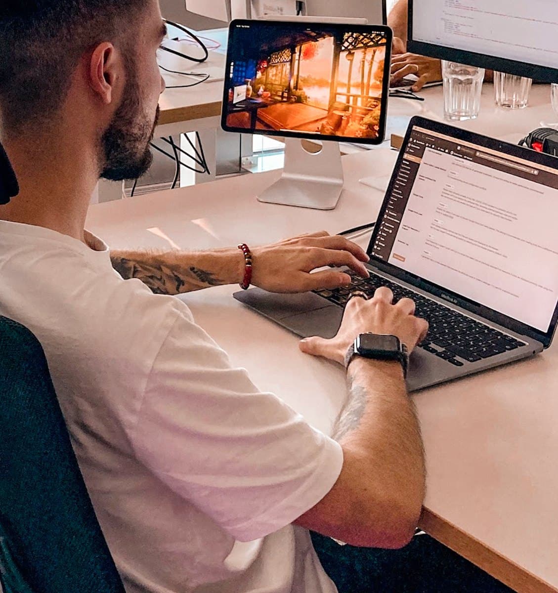 A Webgate designer working on a client website